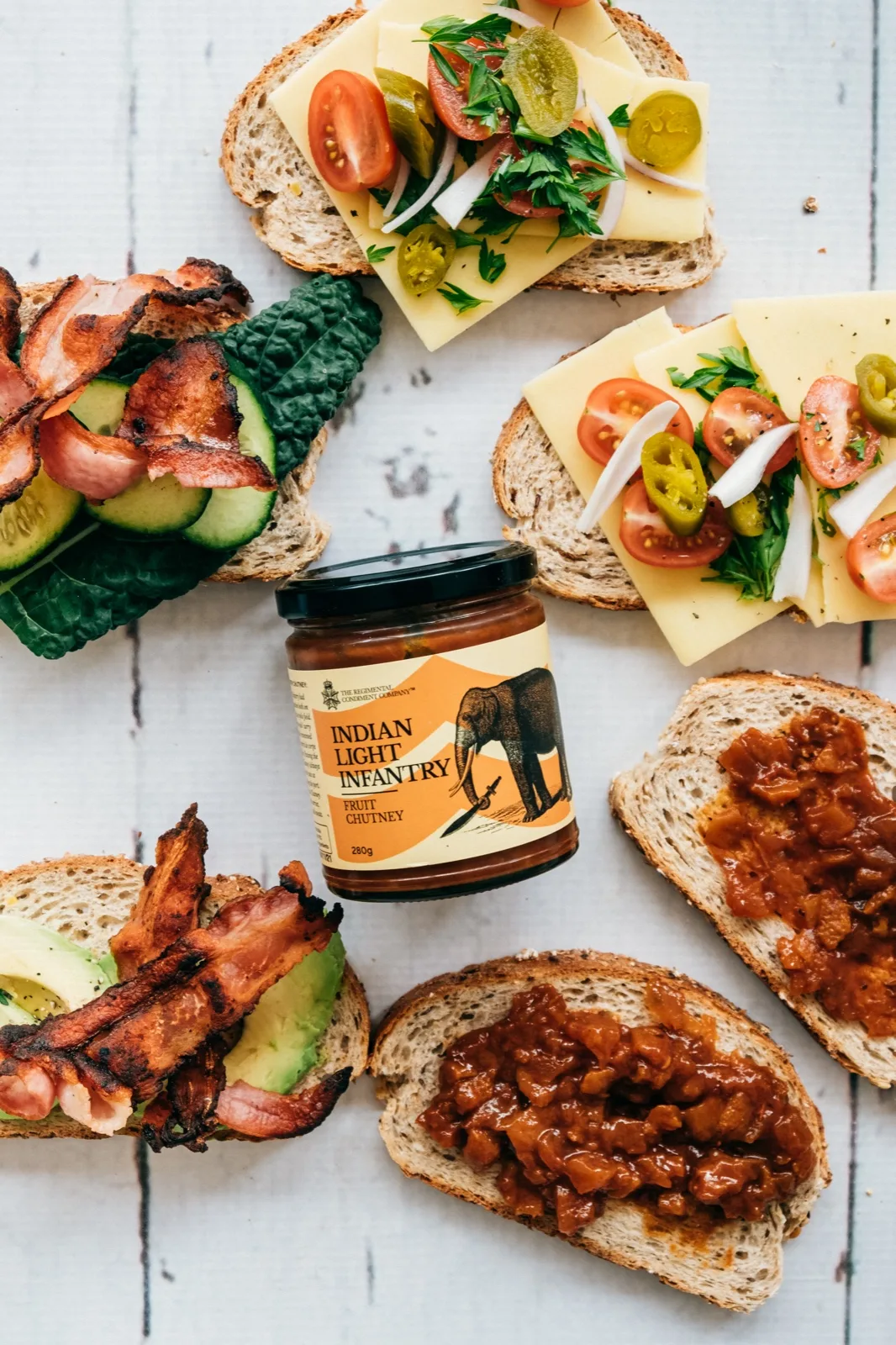 The Regimental Condiment Company fruit chutney spooned thickly onto sourdough beside chedd