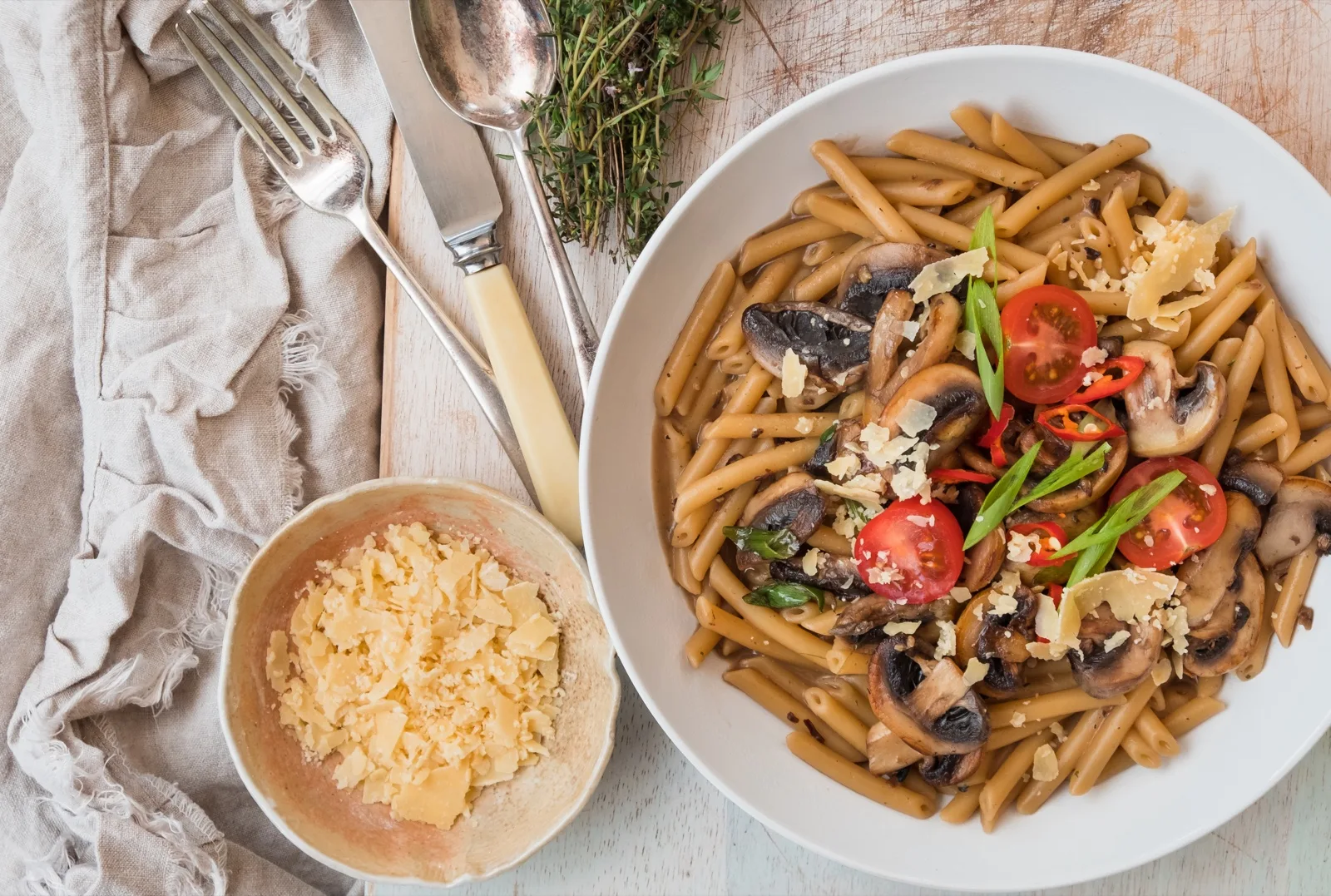 Roasted Swiss brown mushrooms with thyme, chilli and parmesan flakes tossed through penne